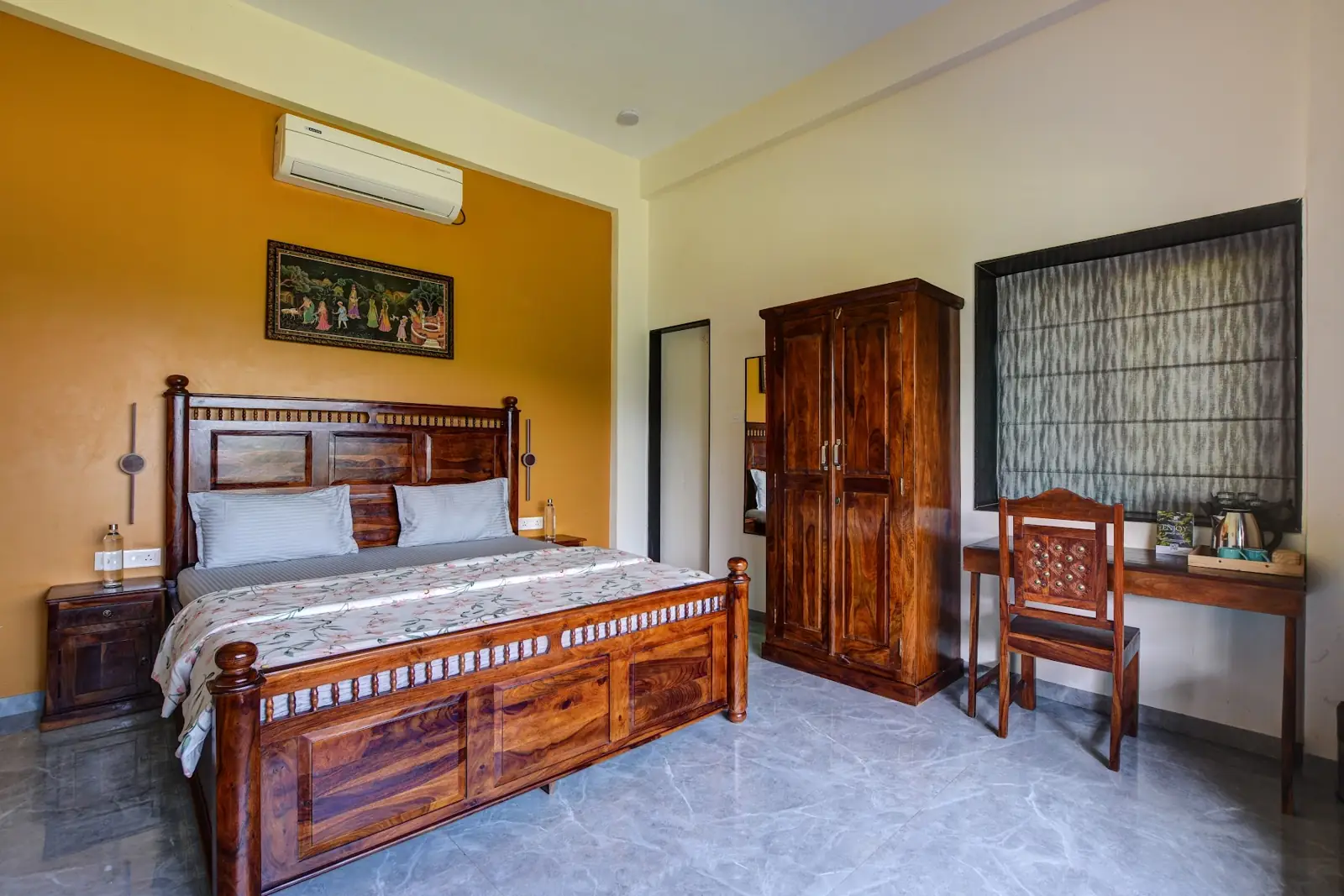 Villa bedroom with a wooden bed