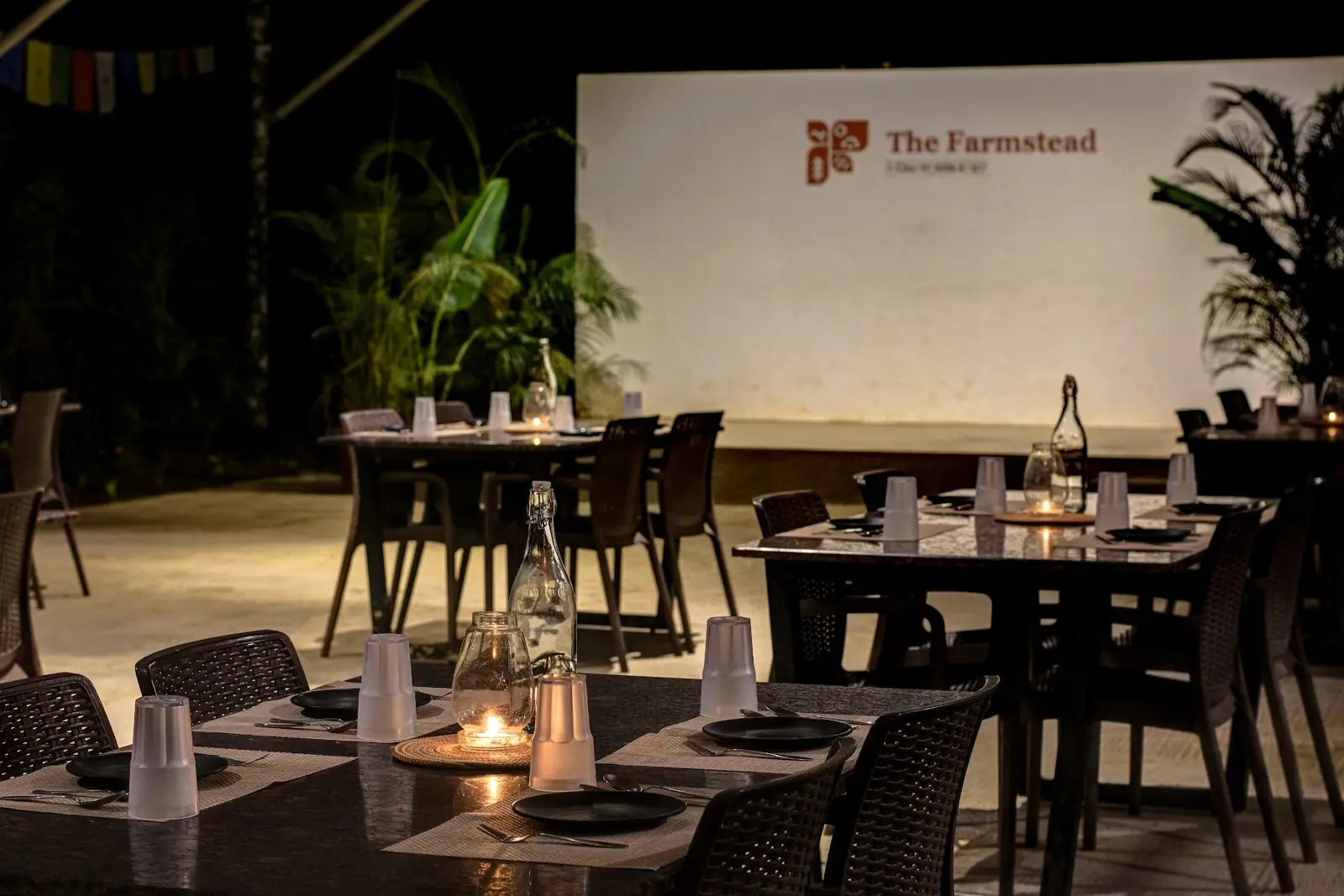 Candlelit dining pavilion at night