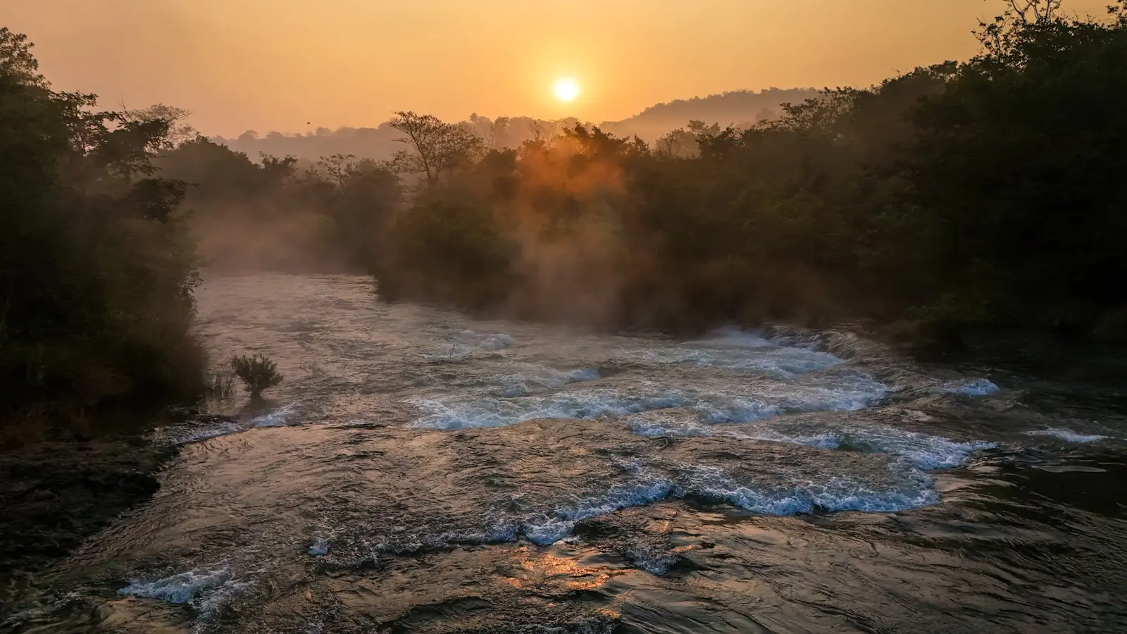 Mist over the Mutha river at sunrise
